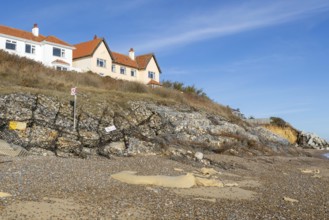Clifftop houses at risk from coastal erosion, Thorpeness, Suffolk, North Sea coast, England, UK