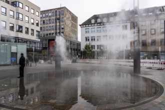 Digital water feature, Blue Cloud water installation on Husemanplatz in downtown Bochum, water mist