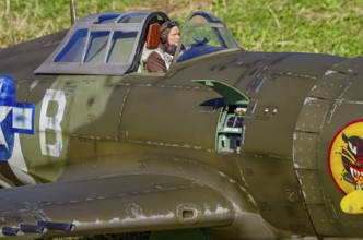 An RC model of a Republic P-47 Thunderbolt during a demonstration as part of an air show at the