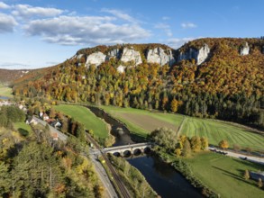 Aerial view of the Upper Danube Valley surrounded by autumn vegetation with the Hausender Peaks