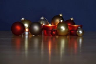 Still life with Christmas tree balls and candles, Germany