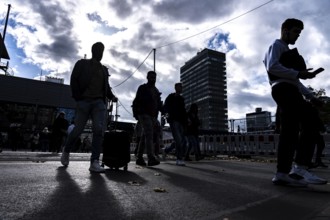 Passers-by in downtown Essen at the main train station, North Rhine-Westphalia, Germany