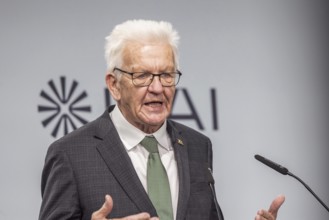 Winfried Kretschmann (Greens), Minister-President of Baden-Württemberg. portrait at the lectern