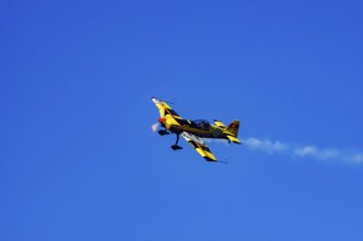 A Votec 351 sport aircraft from the Swiss MSW Aviation AG with registration HB-YMV during a flight