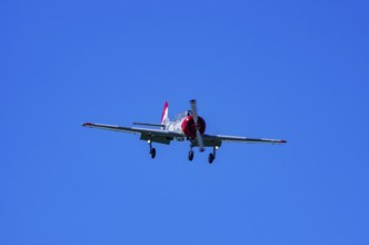 A Jakovlev Jak-52 with registration LY-HLZ during a flight demonstration as part of an air show on