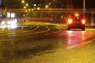 Road traffic at night and poor visibility in a city, autumn, Germany
