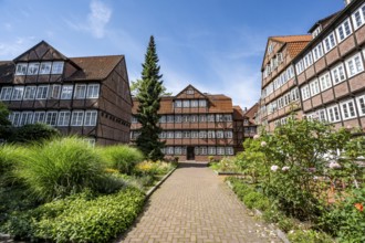Facades of the historic brick buildings, inner courtyard, view over the city, Peterstraße,