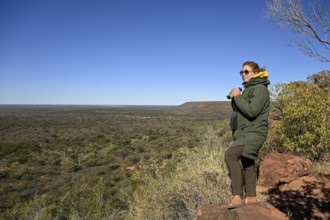 Tourist enjoying the view from Waterberg, Otjozondjupa region, Namibia