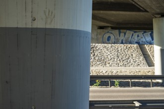 Concrete bridge with graffito in Münsingen on the Swabian Alb, Baden-Württemberg, Germany, for