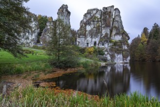 Externsteine in autumn, view over the Wiembecke pond, Teutoburg Forest, Horn-Bad Meinberg, North