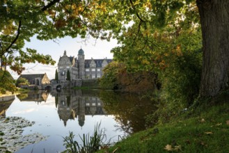 View across the castle pond to Hämelschenburg Castle, a moated castle and major work of the Weser