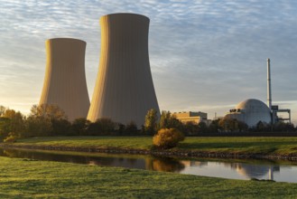 View across the Weser to the cooling towers of the Grohnde nuclear power plant in the morning