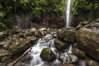 A large waterfall and many small watercourses pour down onto the rocks in the mystical 25 Fontes