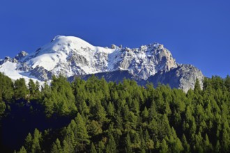 Aiguille des Grands Montets and snow-covered Aiguille Verte, Chamonix-Mont-Blanc, Haute-Savoie,
