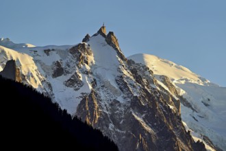 From left snow-covered Aiguille du Midi, Mont-Blanc, Vallot Hut, Chamonix-Mont-Blanc, Haute-Savoie,