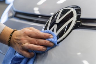 Electric car production in the assembly halls of VW in Zwickau. VW logo, Zwickau, Saxony, Germany