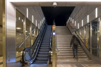 Night photo, long exposure with motion blur, modern underground entrance at Unter den Linden