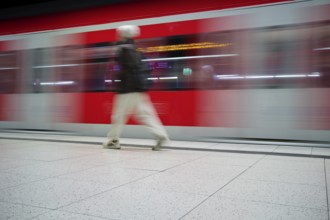 Underground arriving S-Bahn, train, class 420 in traffic red, platform, stop, Stadtmitte station,