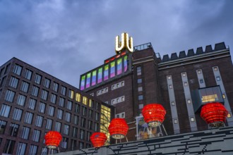 Illuminated sculptures of Dortmund roses in front of Dortmund's landmark U, Centre for Art and