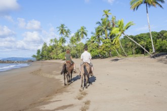Horseback riding on beach, Drake Bay, Corcovado National Park, Osa Peninsula, Costa Rica