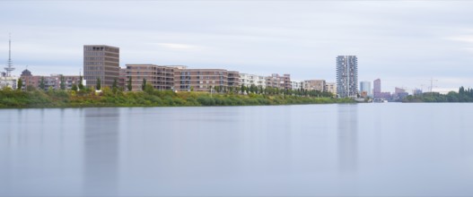 View over the Weser to the Überseestadt, long exposure, Bremen, Germany