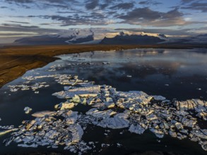 Ice floes, glacier, glacier tongue, fog, clouds, morning mood, mountains, reflection, aerial view,