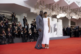 Venice, Italy - 2 September 2025: Idris Elba and Sabrina Dhowre Elba during the red carpet of - A