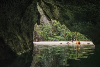 White sandy beach and coconut palms, Pearl Beach, Koh Mook, Trang Province, Southern Thailand,