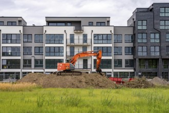 Shell construction, shortly in front of completion of a residential building, new Graf Bismarck