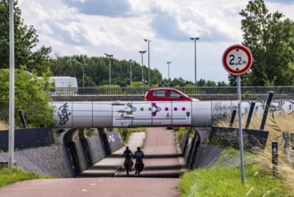 Rijnwaalpad long-distance cycle path, near the village of Elst, subway of the A15 motorway, wide
