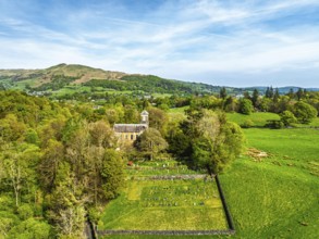 Holy Trinity Church from a drone, Bog Lane, Brathay village, Lake District, Cumbria, England,