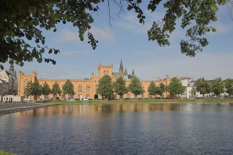 Pfaffenteich with arsenal, church tower of St Paul's Church, shore, lake, Schwerin,