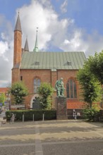 Monument to the writer and poet Emanuel Geibel by Hermann Volz 1889 and Heiligen-Geist-Hospital,