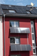 Residential building with photovoltaic modules on the façade and roof, North Rhine-Westphalia,