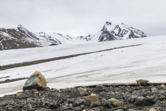 Melting glacier, stones, water, Cooper Camp, Spitsbergen, Svalbard