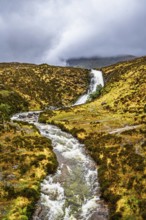 Eas a' Bhradain waterfall, Red Cuillin mountains, Loch Ainort, Isle of Skye, Scotland, UK