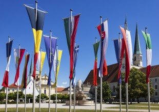 National flags at Kapellplatz with the collegiate parish church of St Philip and St James, place of