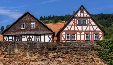 The old town centre with half-timbered houses, church towers and remains of the town wall in