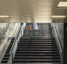 Pedestrians walking up a staircase in the summer heat, Capital of Culture 2026, Trencín, Slovakia