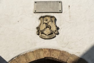 Old relief of the city coat of arms on the city tower of the Capital of Culture 2026, Trencín,