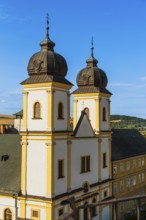 View from the city tower of the Piarist Church of St Francis Xavier and the old town in the evening
