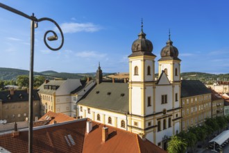 View from the city tower of the Piarist Church of St Francis Xavier and the old town in the evening