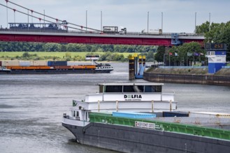 Barge enters the Vinckekanal, in the harbour of Ruhrort, container freighter on the Rhine, on an