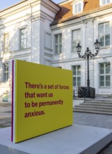 Tony Cokes, visual artist and educator, display panel at the Palais Populaire Unter den Linden,