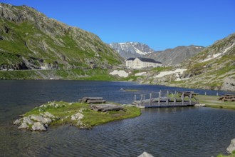 View from Italian side on small island in Lac du Grand Saint Bernard in the background on Swiss