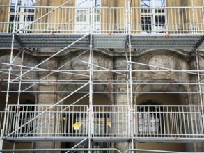 Scaffolded façade of the district court with metal platforms and stairs in Wuppertal, Germany