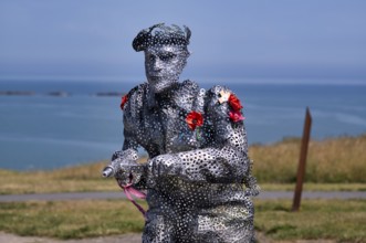 Sculpture by Bill Pendell MM, British World War II veteran, looking back at himself and his