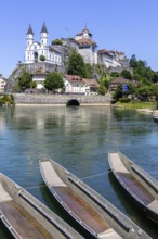 Aarburg town on the River Aare with church, fortress and boats in Aarburg, Switzerland