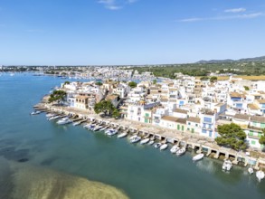 Portocolom fishing village on Majorca aerial view from above with boats holiday by the sea trip in