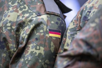 Bundeswehr symbolic image: close-up of the German flag on the Bundeswehr uniform